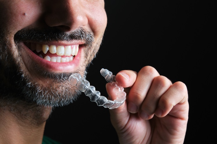 guy-putting-mouthguard-in-his-mouth