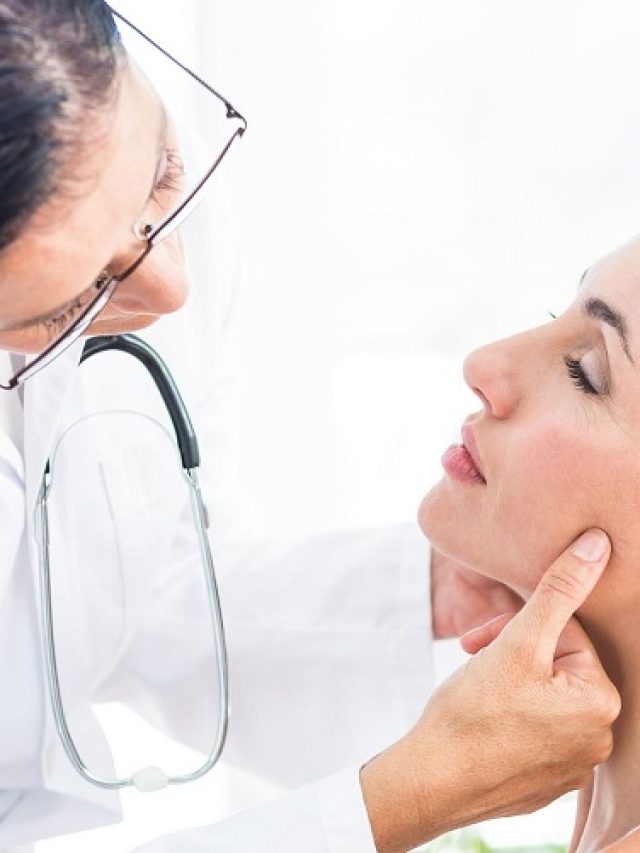 dentist-checking-a-womans-jaw