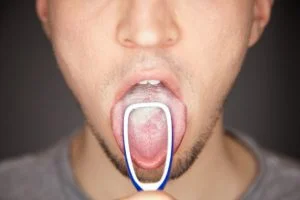 Tongue Scraper to loosen and remove film and bacterial plaque and clean mouth to prevent bad smell