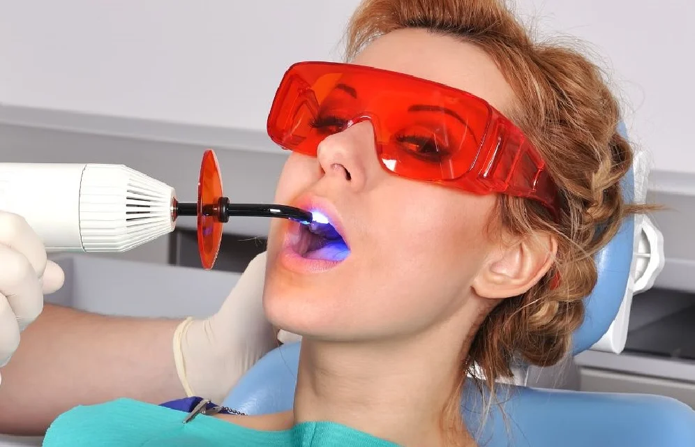 a girl having dental filling