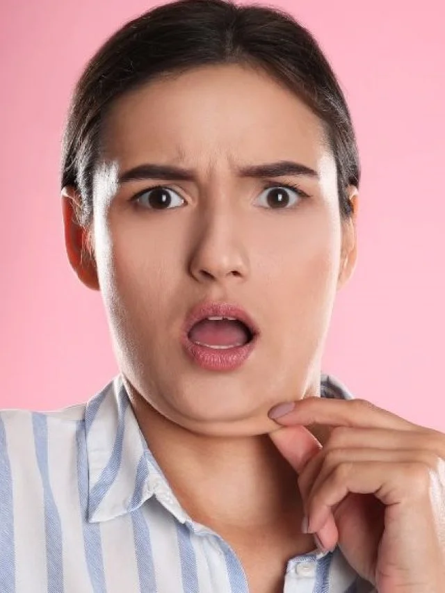 a girl touching her chin