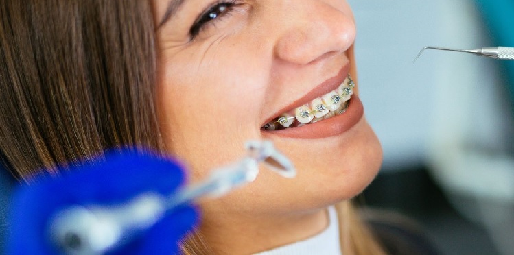 girl showing her braces