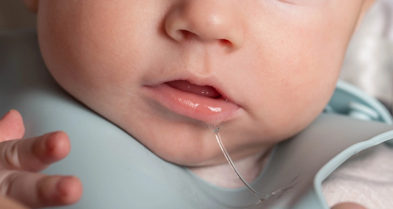 infant is producing excess saliva