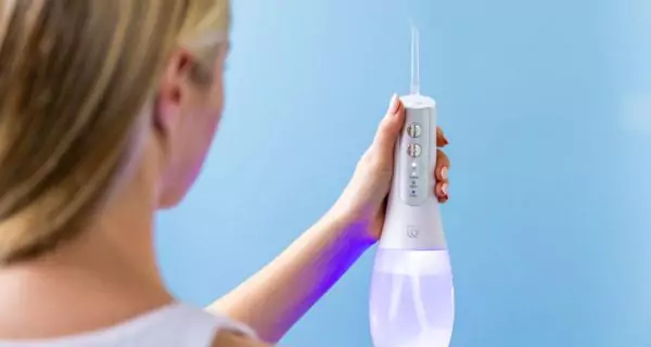 What is an oral irrigator?