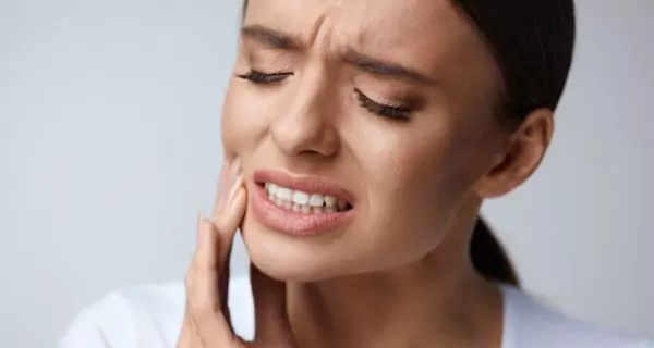 When should you see a dentist immediately?