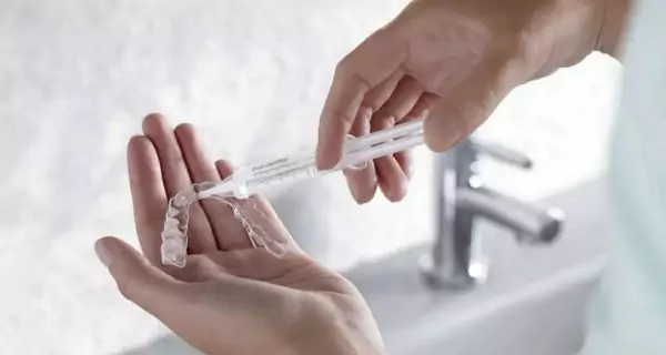 How to use a teeth whitening kit effectively?
