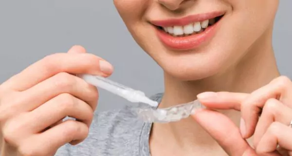 What are the benefits of whitening your teeth at home?
