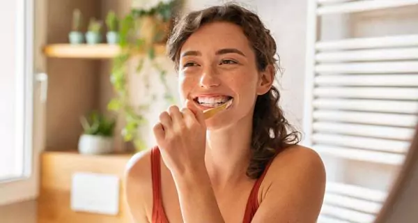 How often should I brush my teeth?