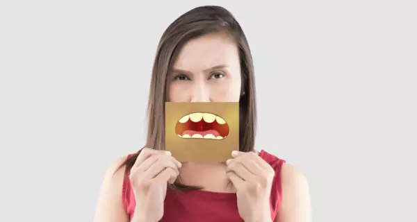 Why does stress increase the risk of oral problems?