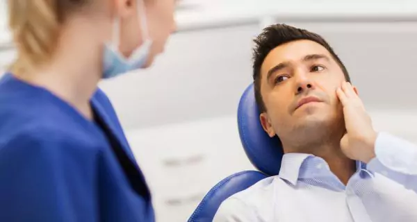 When should you see a dentist or doctor?