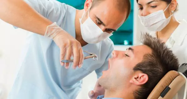 Who is most at risk of oral problems from multivitamins?