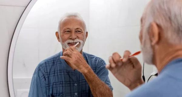 How is poor oral hygiene connected to Alzheimer’s disease?