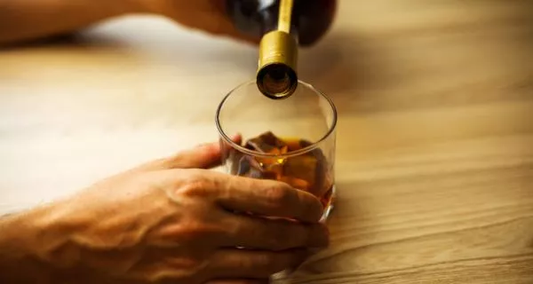 Can I drink alcohol after a tooth extraction?