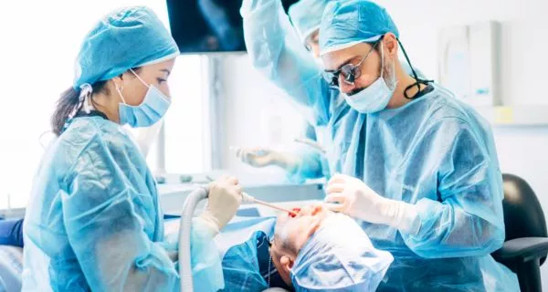 What is a surgical extraction?