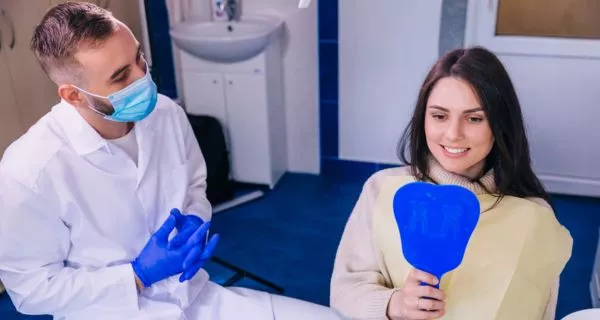 When should you see a dentist for lingual frenulum pain?