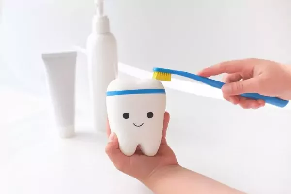 little-girl-cleaning-toy-tooth-with-toothbrush-q2u0g80d5nijkm7dlt4skgfpmmb1ptkxclf7otbzj4-64dceacdd0f5d