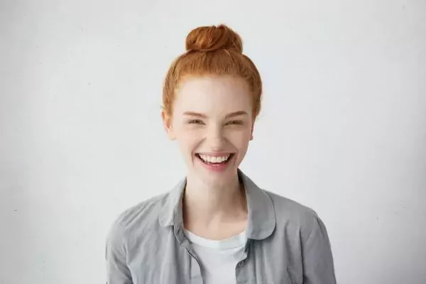 portrait-of-red-haired-woman-with-pleasant-features-dressed-in-casual-grey-shirt-smiling-with-touchi-q2ug11fss58cl1l3tq4hqfpcxs3x8mzk4dten3sx40-64dceace0e721